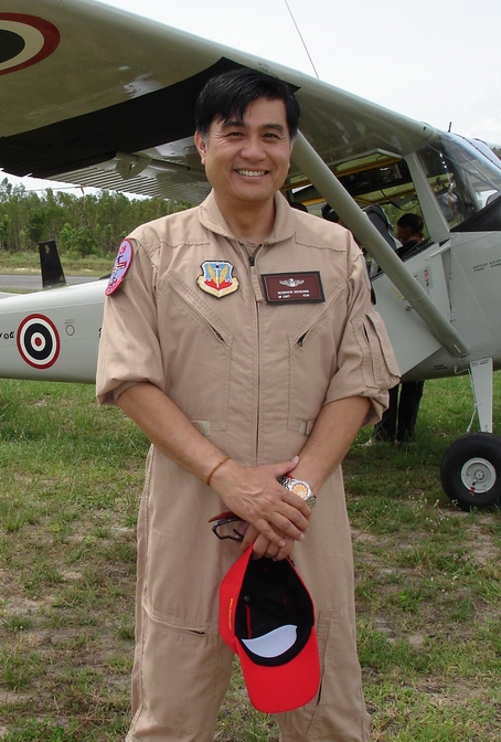 Group Captain Virayudth Didyasarin and O-1 "Birddog" from Tango Squadron