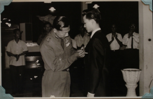 Khun Thira receiving his wings.