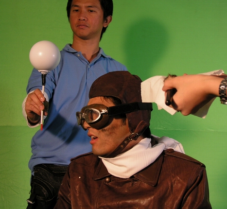 Khun Ravit and Sonram working on the "green screen" for the CG aerials