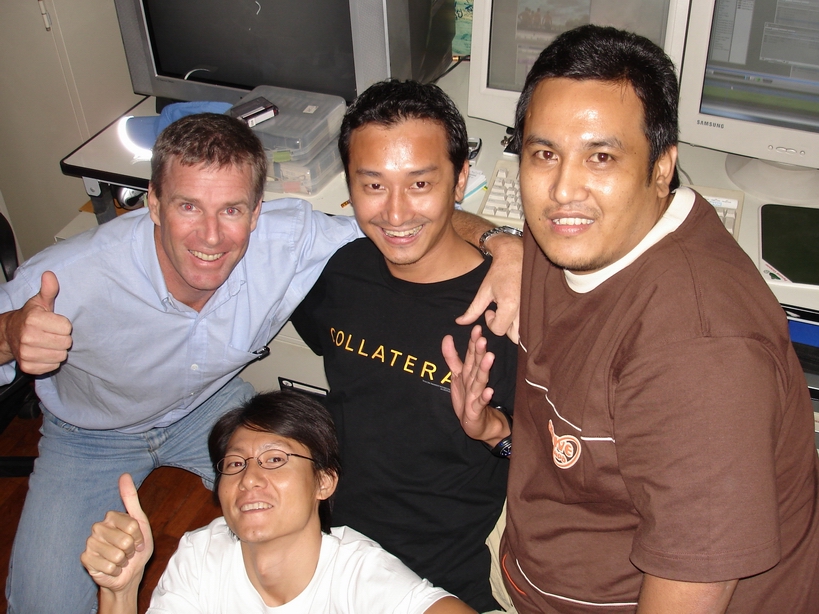 Khun Tom, Khun Mee, Khun Ek and Khun Rashane celebrating after several hours work putting aerial scenery into the final cut of "First Flight."